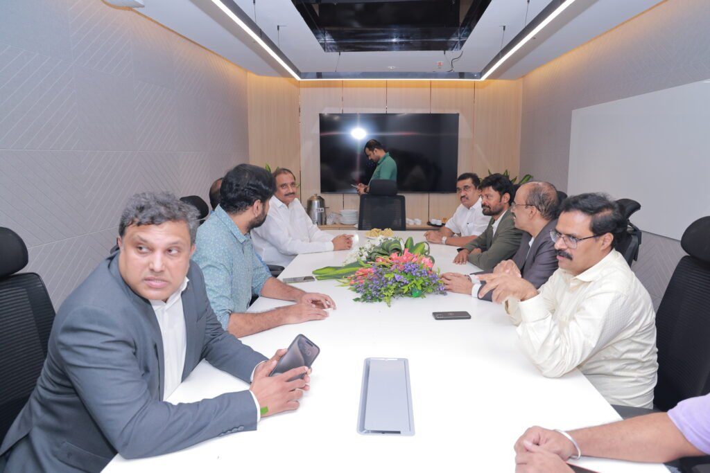 A meeting in the boardroom of the QuadricIT Delivery and Innovation Centre, Hyderabad
